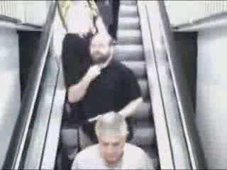 Women Falling Down Escalator